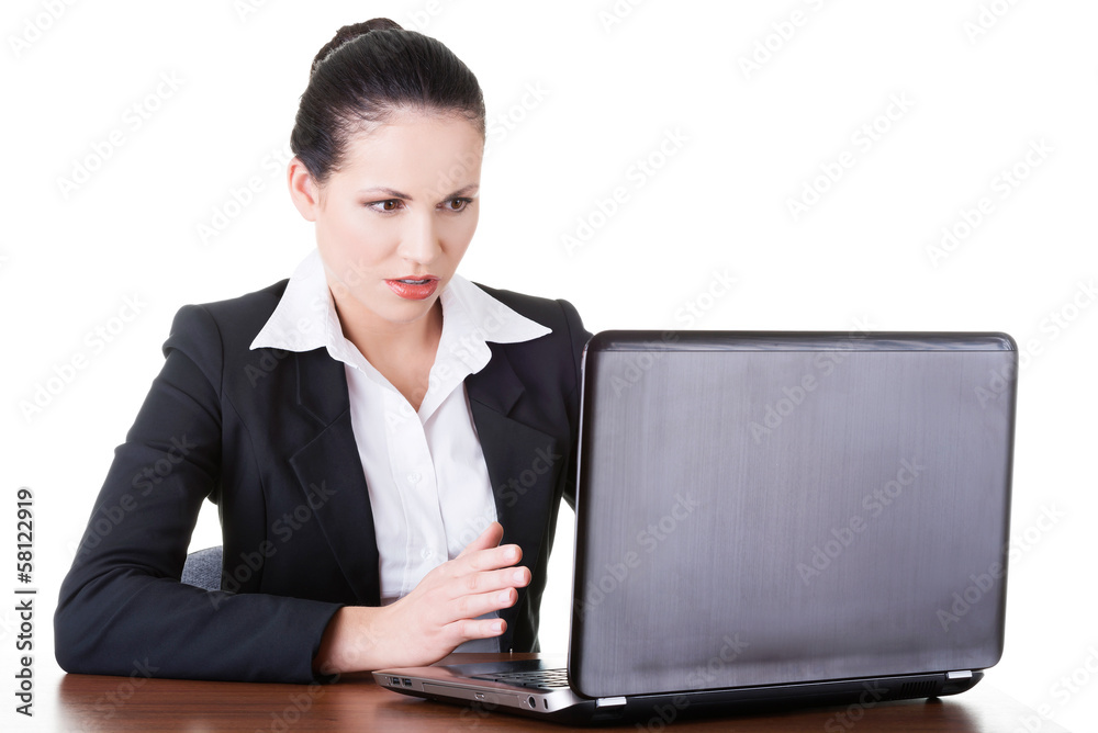 Business woman sitting with laptop. Business woman sitting with laptop.
