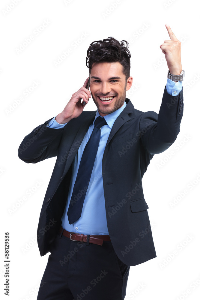 business man talking at the phone and winning business man talking at the phone and winning