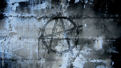 Anarchy symbol in urban wall photo