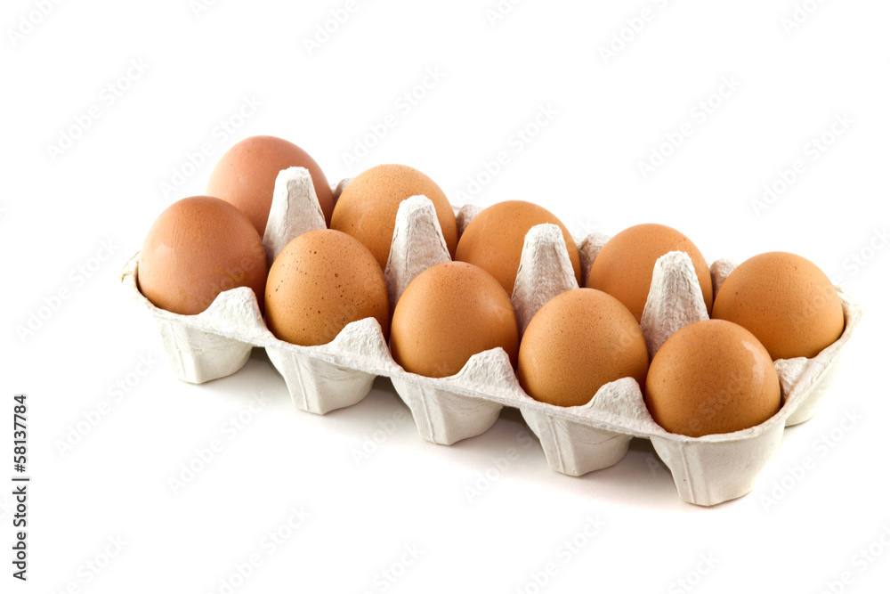 The brown eggs in egg box