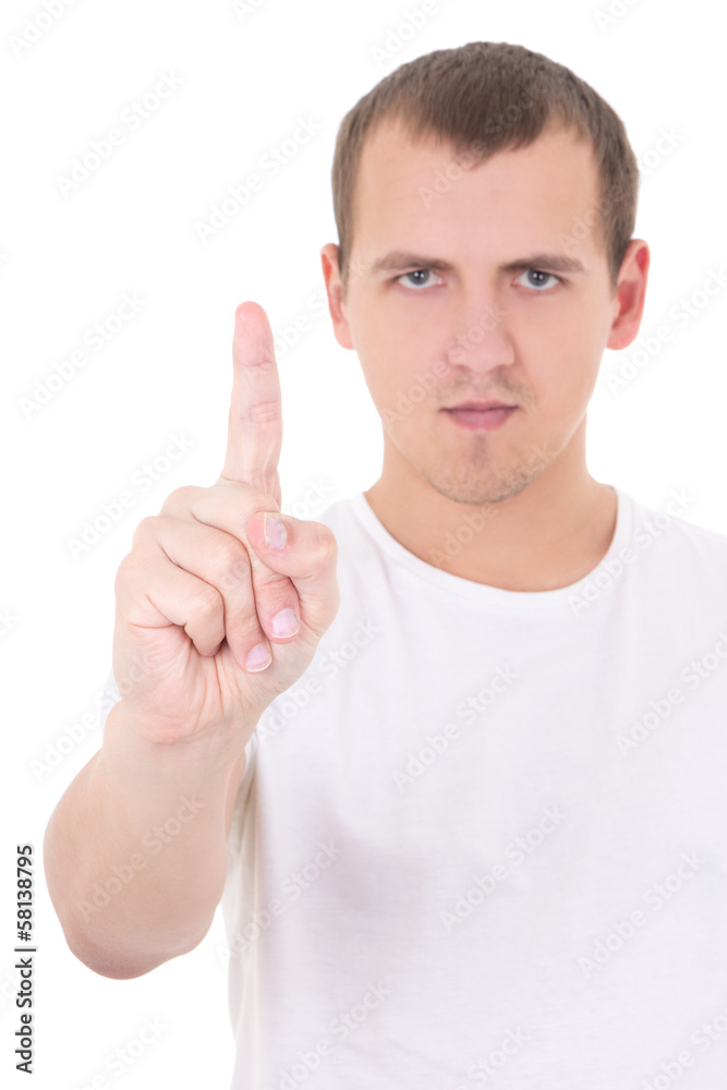portrait of young man pointing upwards over white background