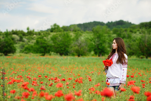 Ukrainian girl in poppy field