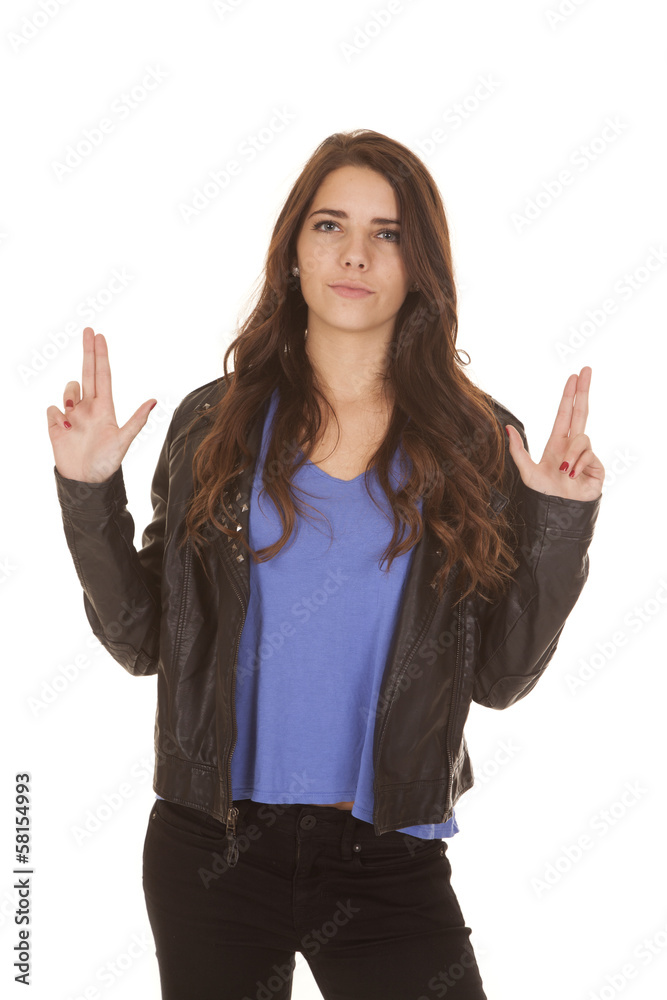 Woman black jacket fingers as guns Woman black jacket fingers as guns