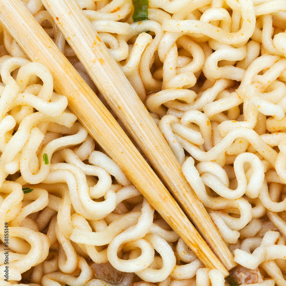 eating instant ramen by wooden chopsticks eating instant ramen by wooden chopsticks