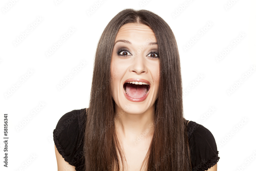 Portrait of beautiful smiling girl posing on white background Portrait of beautiful smiling girl posing on white background