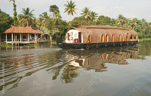 houseboat in backwaters near trees