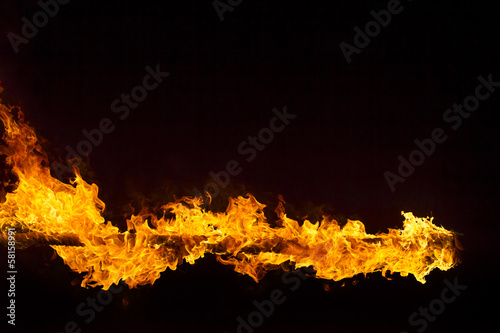 Blazing flames on black background © Netfalls