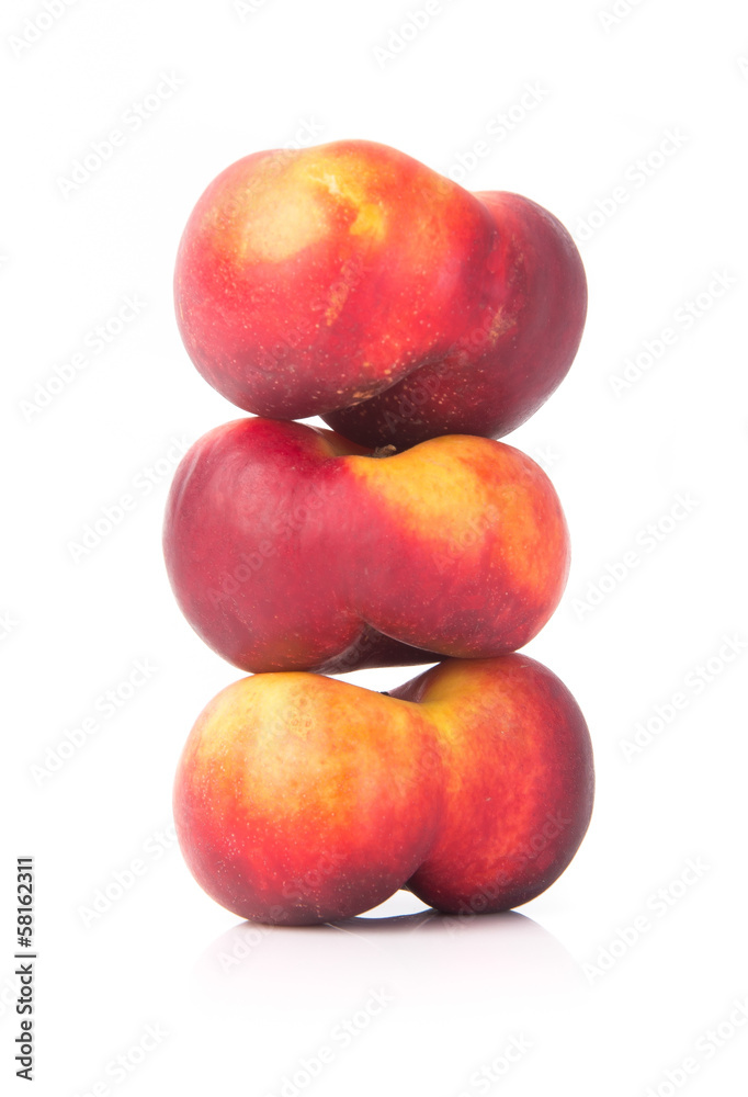 flat peaches (donut peaches) on a background flat peaches (donut peaches) on a background