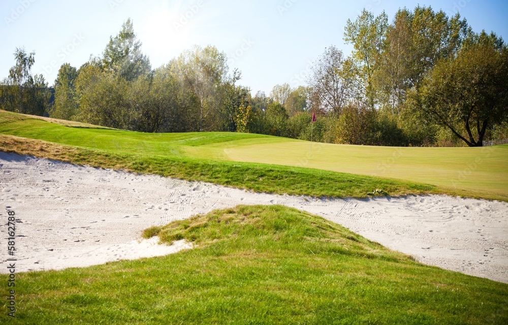 Golf course landscape view, field and sand bunker Golf course landscape view, field and sand bunker