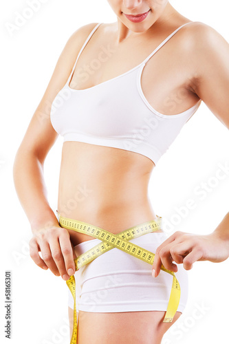 woman measuring her shapes