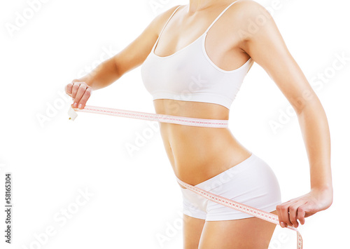 woman with measure on sporty body