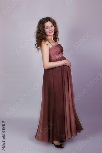 Portrait of a beautiful pregnant young woman