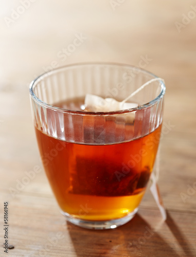 Brown tea on glass cup