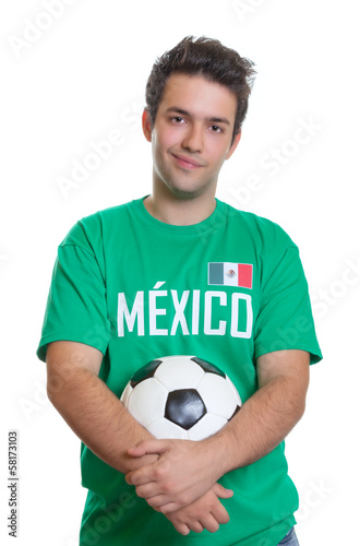 Smiling mexican football fan with ball