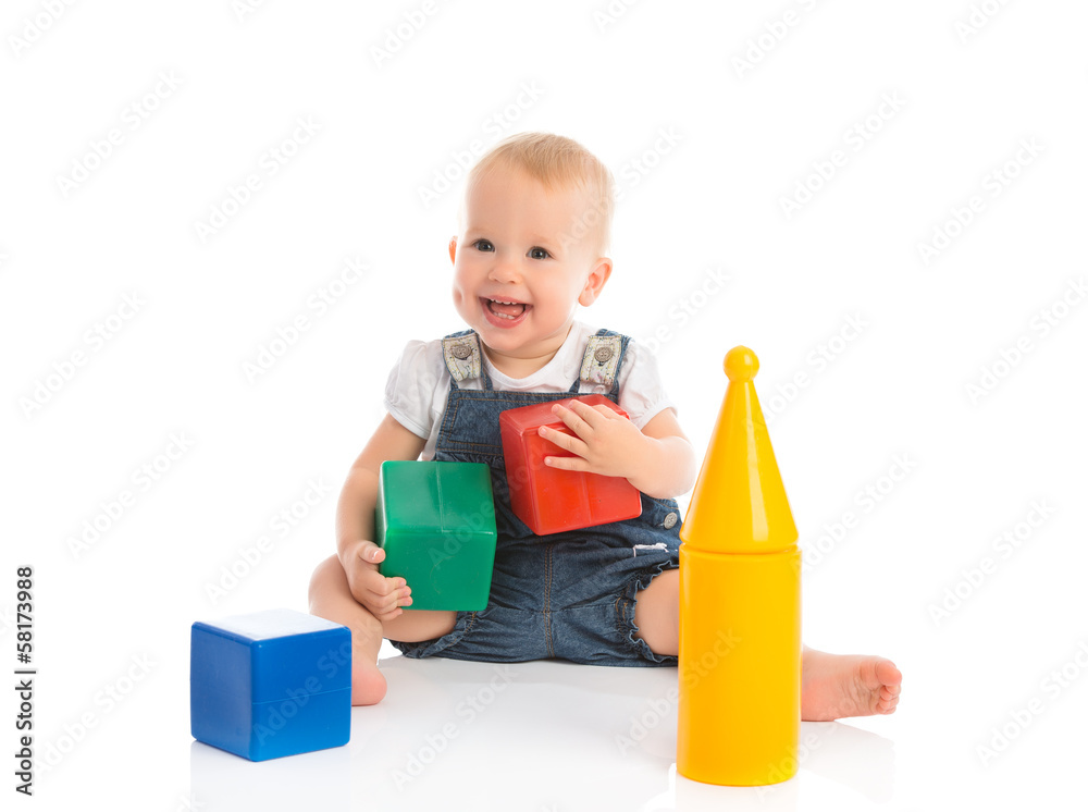 happy cheerful child playing with blocks cubes isolated on white happy cheerful child playing with blocks cubes isolated on white