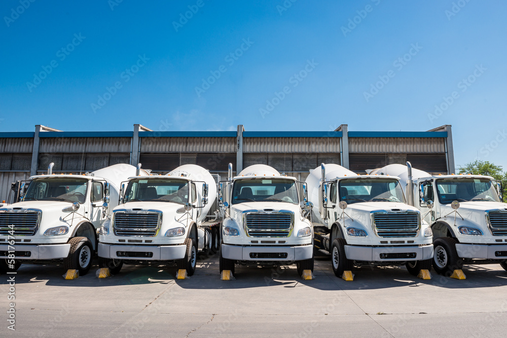 Concrete trucks parked in the city