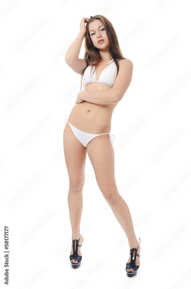 The girl in bikini isolated on white background The girl in bikini isolated on white background