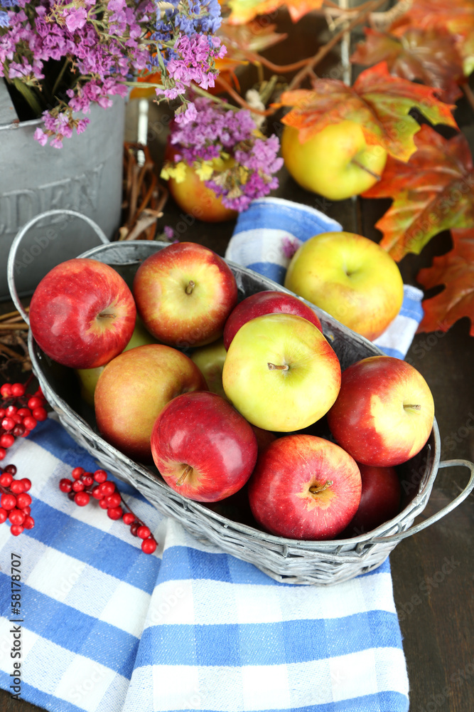 Juicy apples in basket on table close-up Juicy apples in basket on table close-up