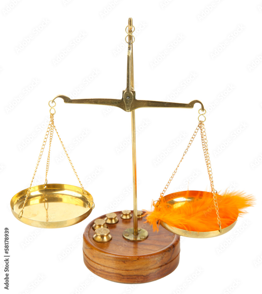Balance scale with feather isolated on white Balance scale with feather isolated on white