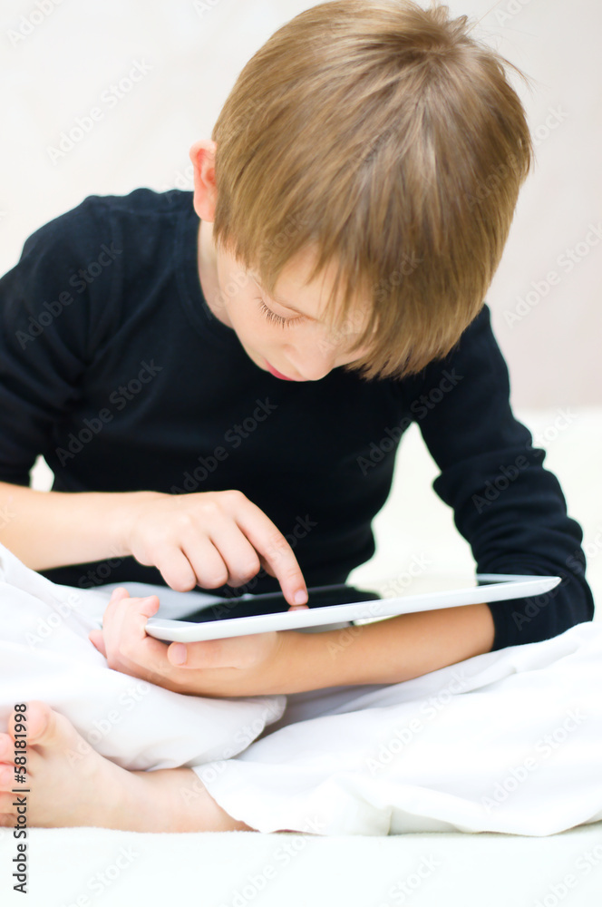 kid using tablet computer kid using tablet computer