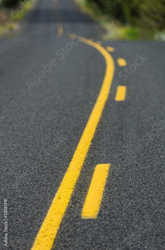 Yellow lines on rural roadway
