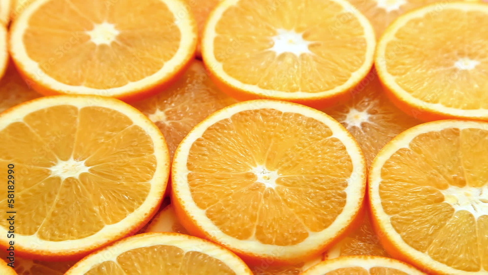 Fresh and juicy sliced oranges motion background Fresh and juicy sliced oranges motion background