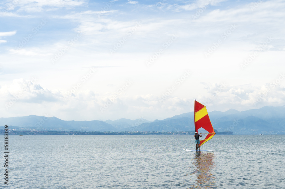 Fototapeta premium surfer on lake