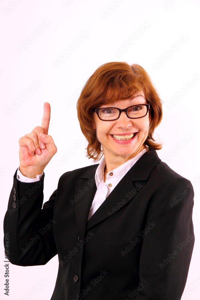 Happy, mature redhead business woman with eyeglasses Happy, mature redhead business woman with eyeglasses