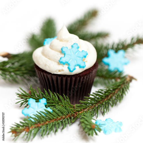 Christmas theme. Cupcake with snowflake