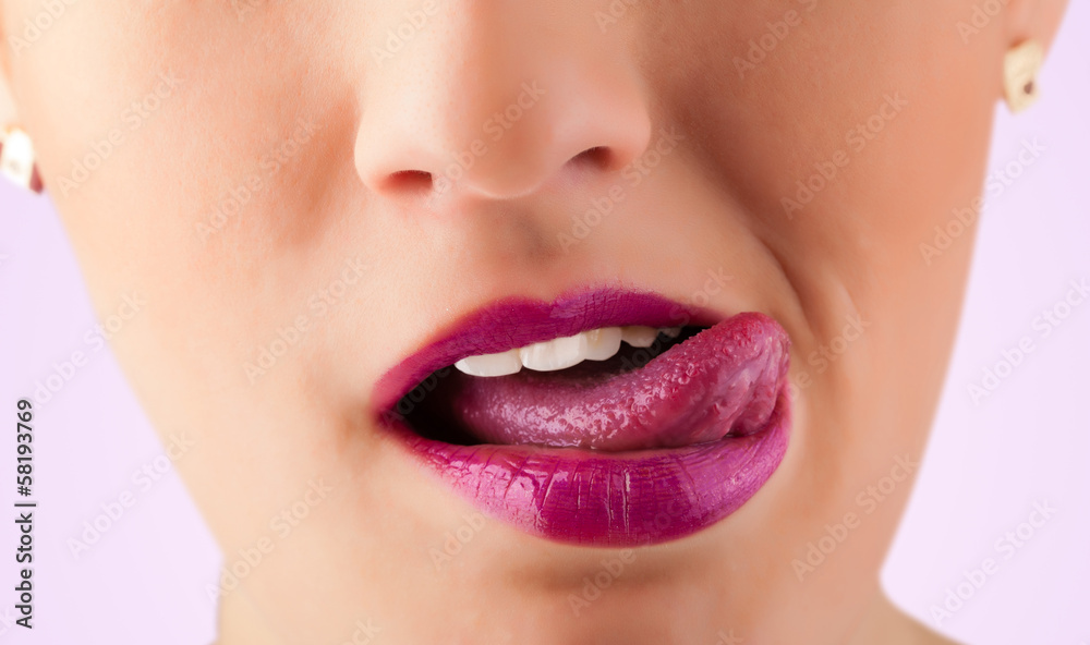 Fototapeta premium Beautiful woman red lips close up