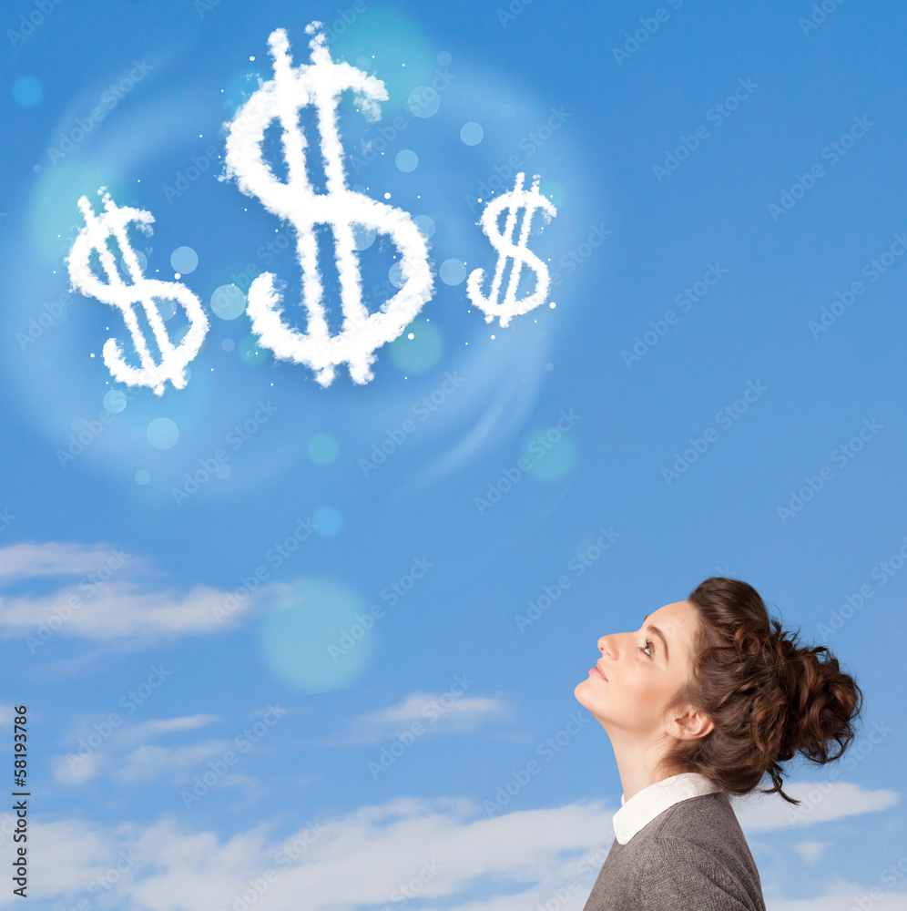 Young girl pointing at dollar sign clouds on blue sky Young girl pointing at dollar sign clouds on blue sky