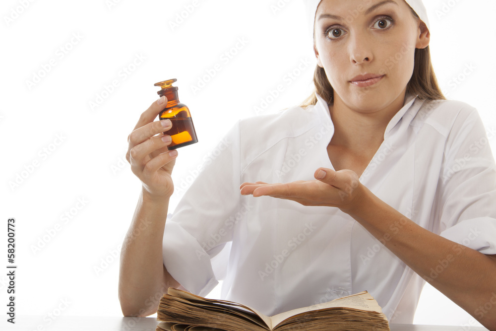 woman doctor with medication in glass bottle woman doctor with medication in glass bottle