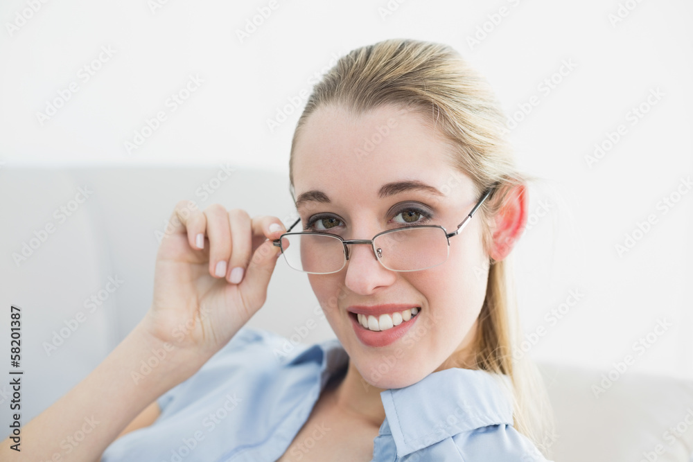 Lovely calm businesswoman relaxing sitting on couch Lovely calm businesswoman relaxing sitting on couch
