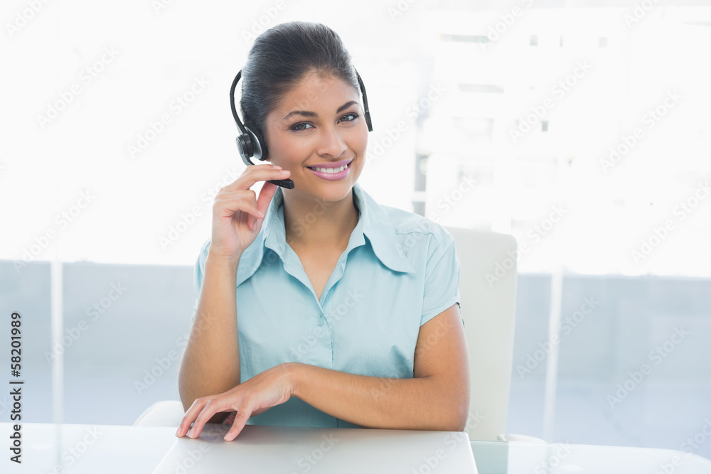 Confident businesswoman wearing headset Confident businesswoman wearing headset