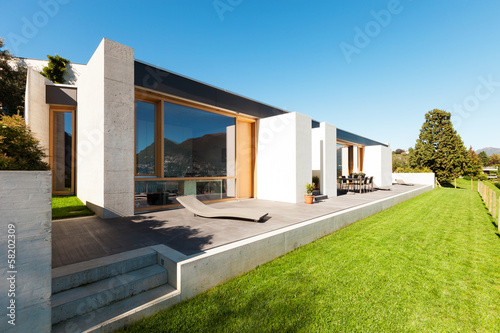 Modern house in cement, view from the garden