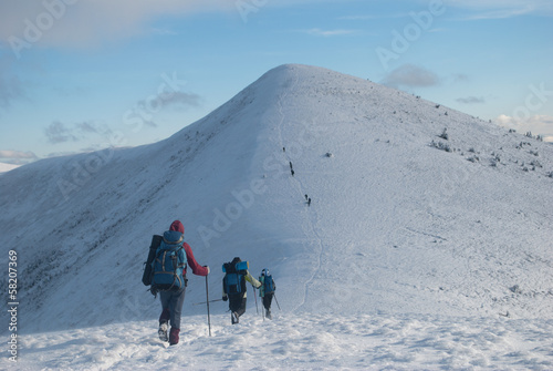hikers in a winter mountain