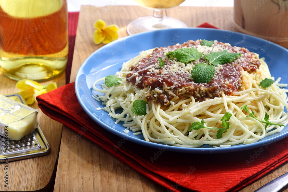 Spaghetti with cheese and mint leaf