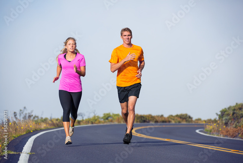 Fitness sport couple running jogging outside