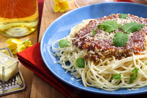 Spaghetti with cheese and mint leaf