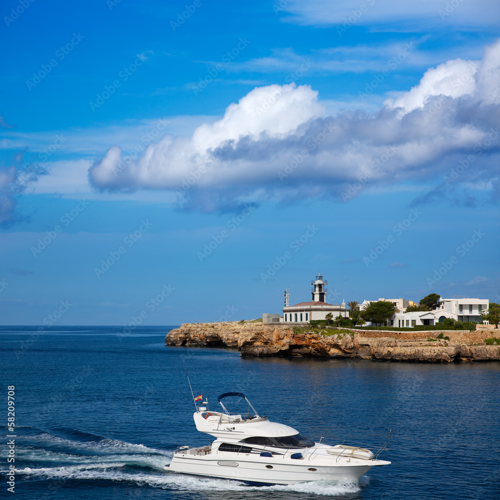 Ciutadella Sa Farola Lighthouse with yatch boat Ciutadella Sa Farola Lighthouse with yatch boat