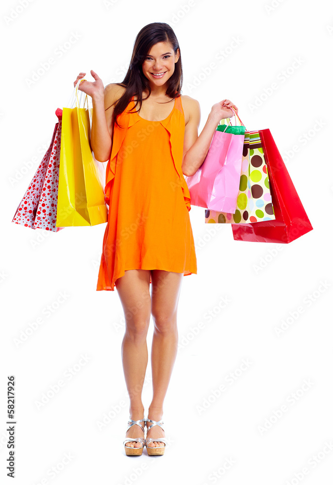 Happy shopping girl with bags.