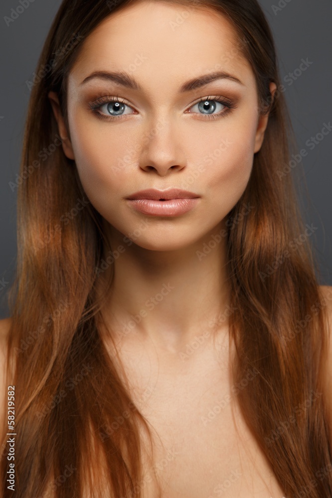 Beautiful young brunette woman with blue eyes Beautiful young brunette woman with blue eyes