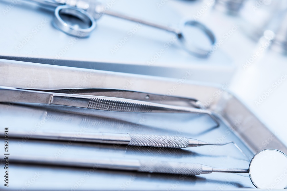 Dental tools and syringe at dentist's surgery Dental tools and syringe at dentist's surgery