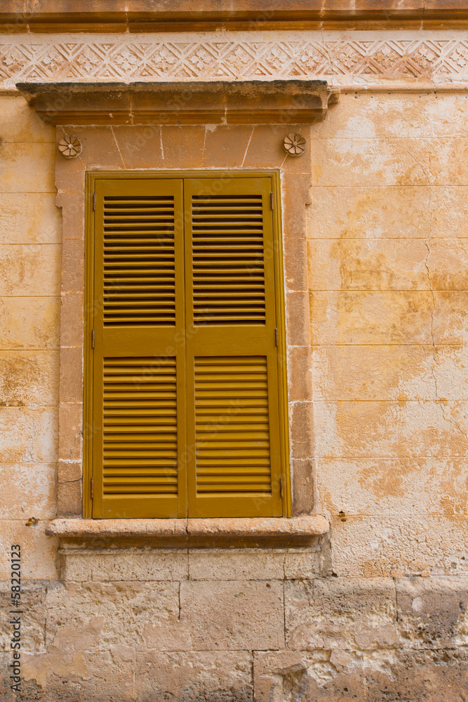 Fototapeta premium Ciutadella Menorca wooden shutter window