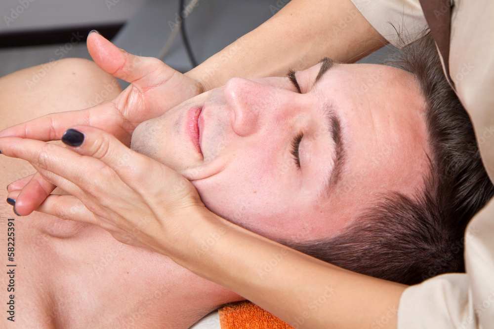 Man getting massage in thebeauty center Man getting massage in thebeauty center