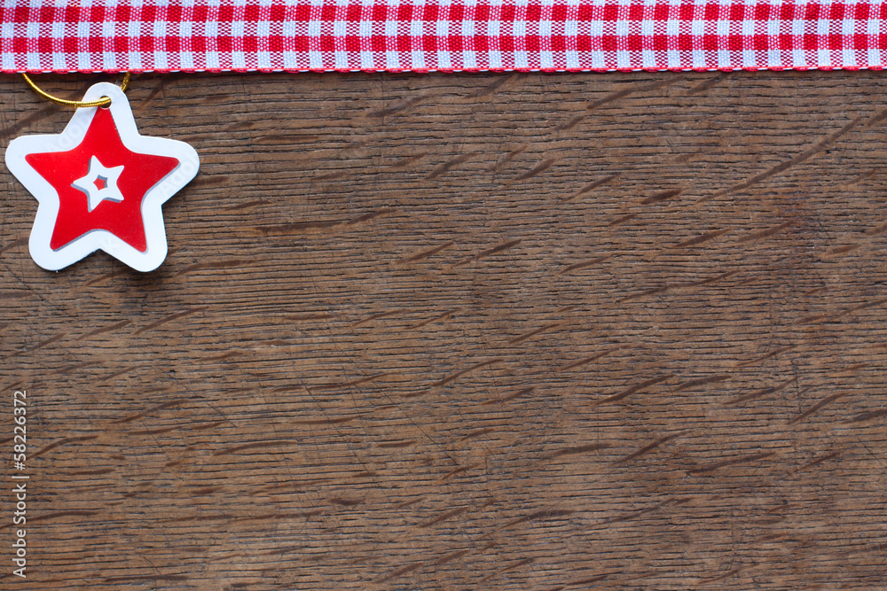Obraz premium paper star on a wooden background