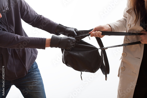 Tableau sur toile Thief trying to snatch a backpack