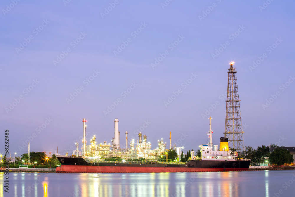 Oil refinery plant with tanker night