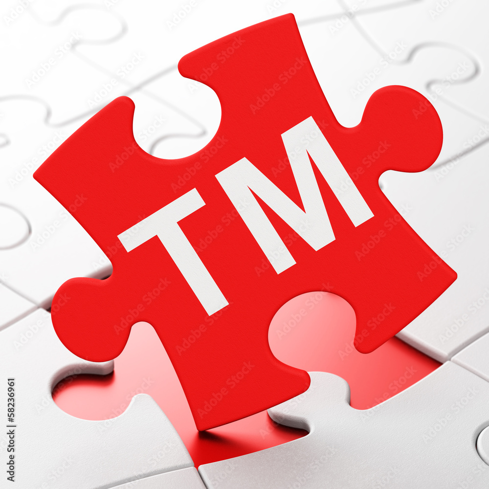 Law concept: Trademark on puzzle background