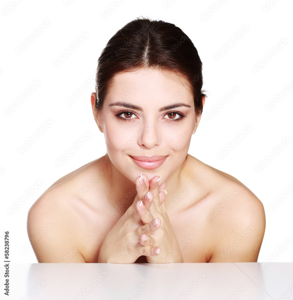 Fototapeta premium Beauty shot of a young model touching her face 